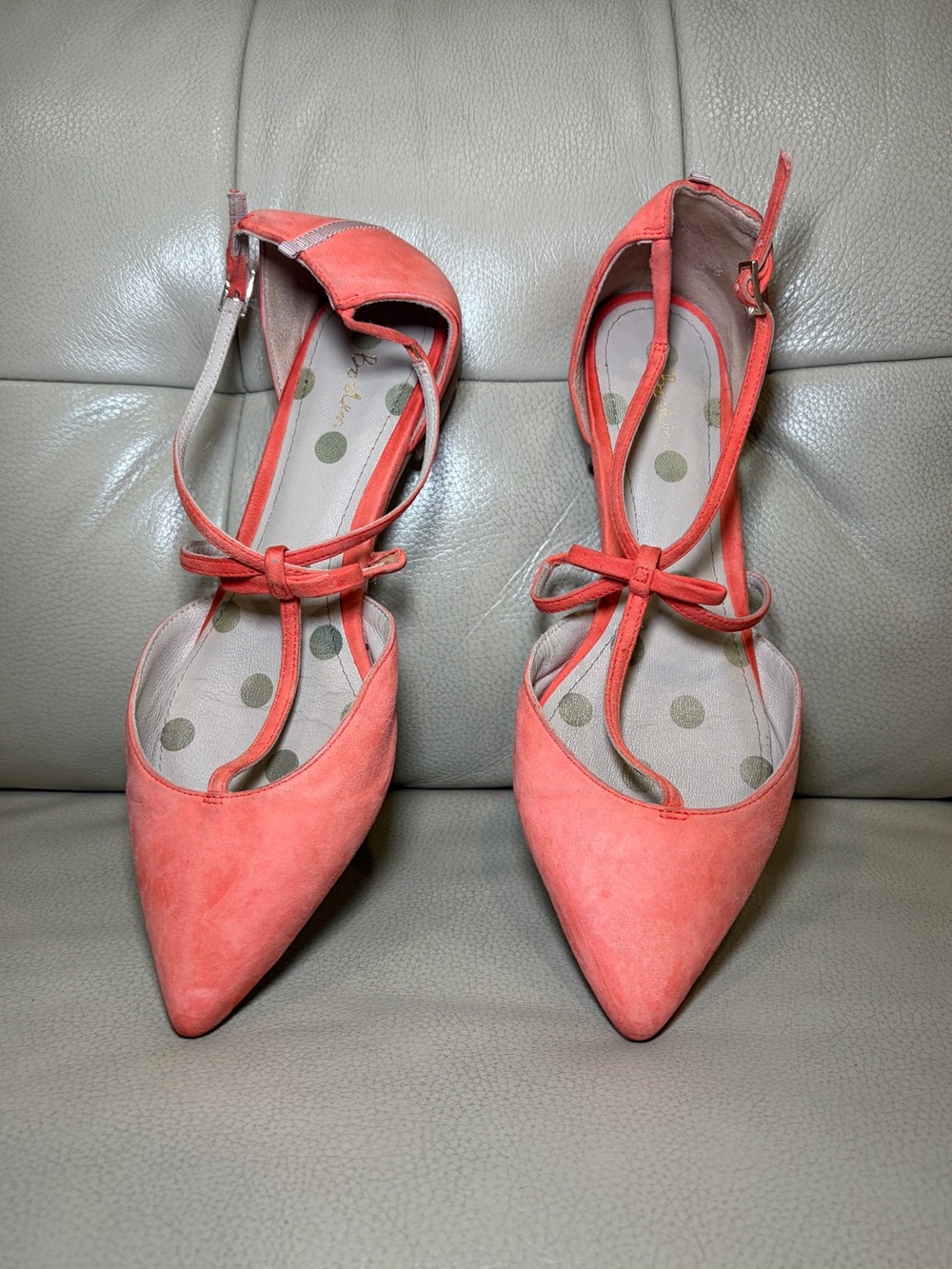 BODEN |  coral pointed-toe t-strap heels with bow detail.